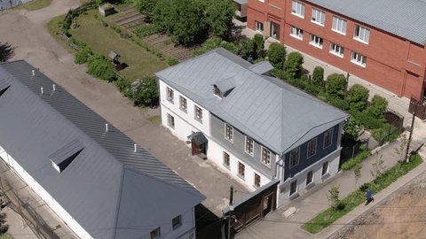 Aerial Orbit around Houses Yard Gardens