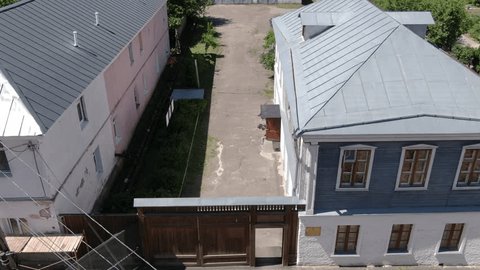 Drone Tracking Sideways near Two Story Residential