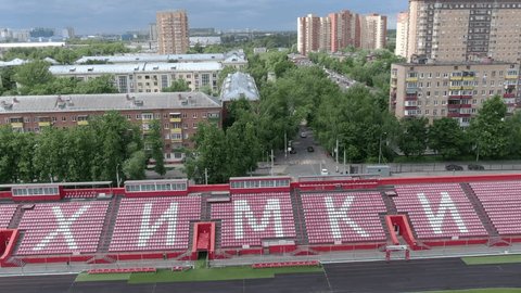 Drone Ascending above Stadium Tilting Field