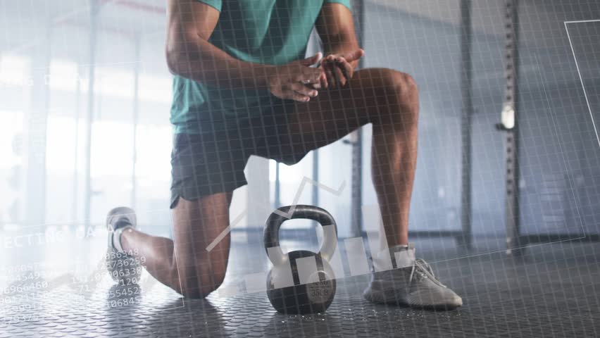 Man kneeling rubbing palms, reaching for kettlebell and lifting in gym, HUD overlays analyzing form. Weights, training, athlete, focus, metrics, display, barbell