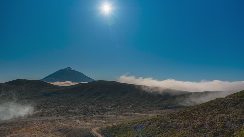 4K time-lapse of flowing sea of clouds around Mount Teide volcano, Tenerife