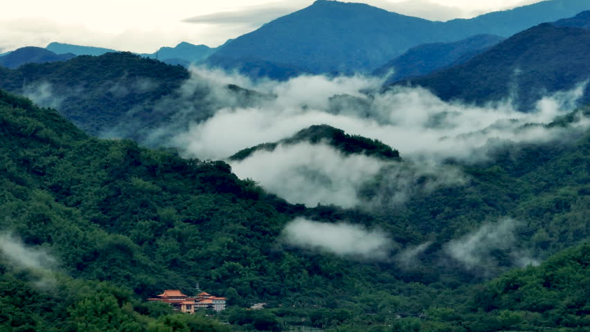 Aerial view misty foggy mountain landscape with temple