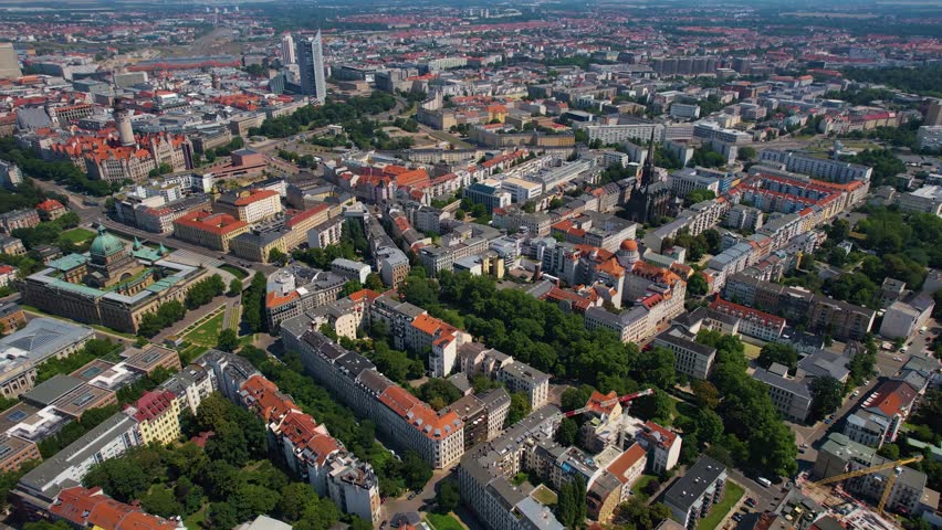 Aerial view around the old town of the city Leipzig on a sunny spring noon in Germany.