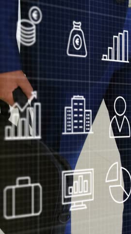 Vertical video: Exec with briefcase as camera rising HUD finance icons framing looking up for pitch. Atrium, corporate, leader, growth, presentation, glass, vertical video