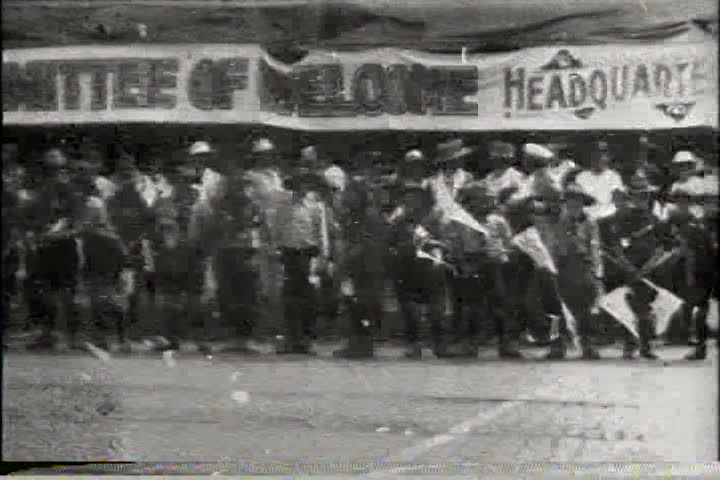 1910s - Canada welcomes American World War 1 troops in 1918 (film damage).