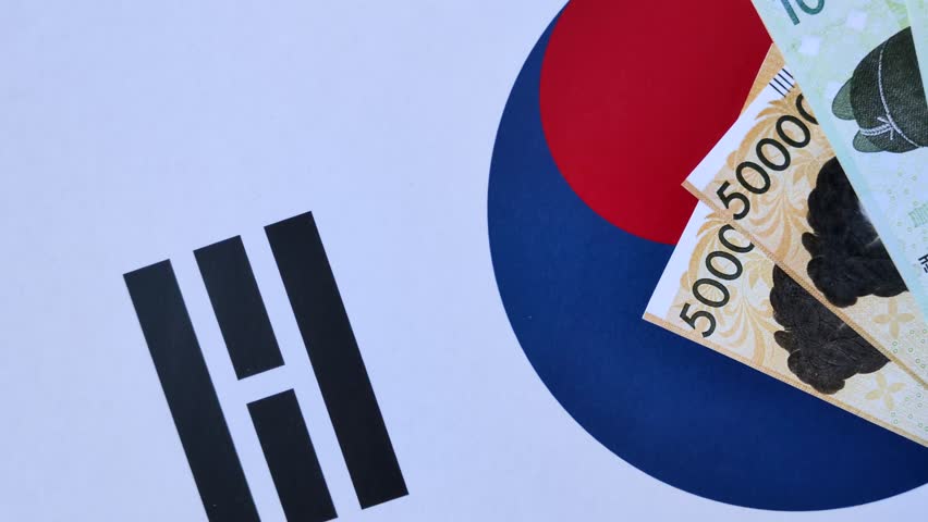 Korean paper money, won, and cash banknotes for financial and business transactions. Korean money as a background for your design