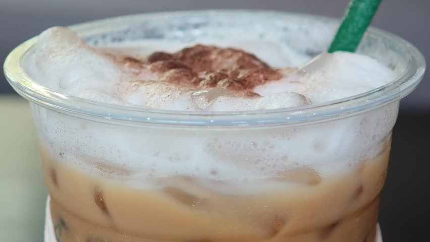 Freshly brewed cappuccino in a mug.