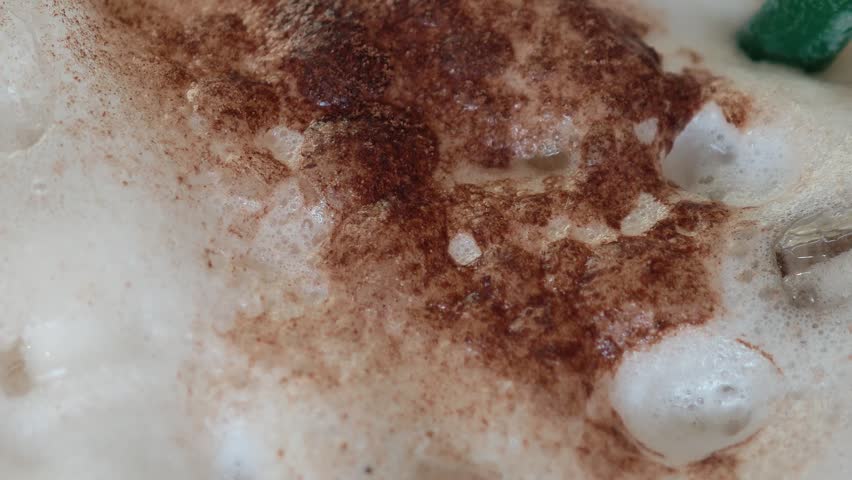 Freshly brewed cappuccino in a mug.