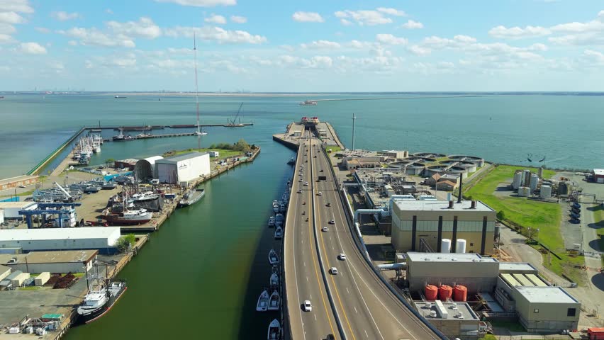 Aerial video of the Monitor-Merrimac Memorial Bridge-Tunnel (I-664) entrance in Newport News, Virginia