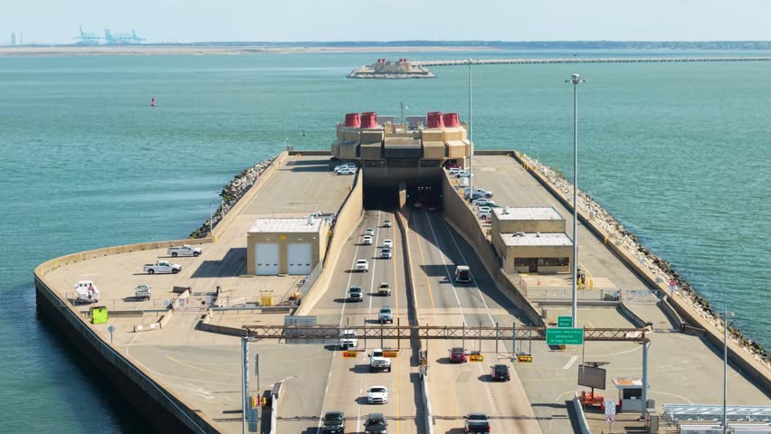 Aerial video of the Monitor-Merrimac Memorial Bridge-Tunnel (I-664) entrance in Newport News, Virginia
