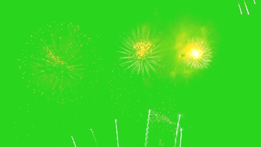 A seamless loop of bright yellow and white fireworks exploding on a bright green screen. Ideal for chroma key overlays for celebrations, holidays, and parties. A green screen shot featuring a vibrant and colorful fireworks display lighting up the sky with bursts of light and colors.