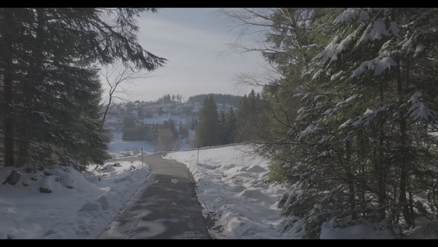 Cinematic drone footage capturing the stunning winter landscape of Schönwald in Germany