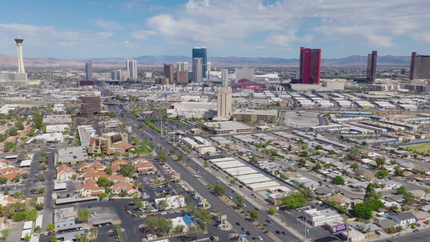Aerial drone pullback shot of Las Vegas Strip hotels and downtown Vegas skyline