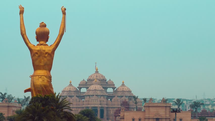Beautiful cinematic view of Akshardham temple in Delhi featuring the peaceful Swaminarayan meditation statue and grand architecture.