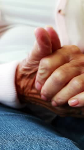 Extreme close up view of retired person rubbing one
