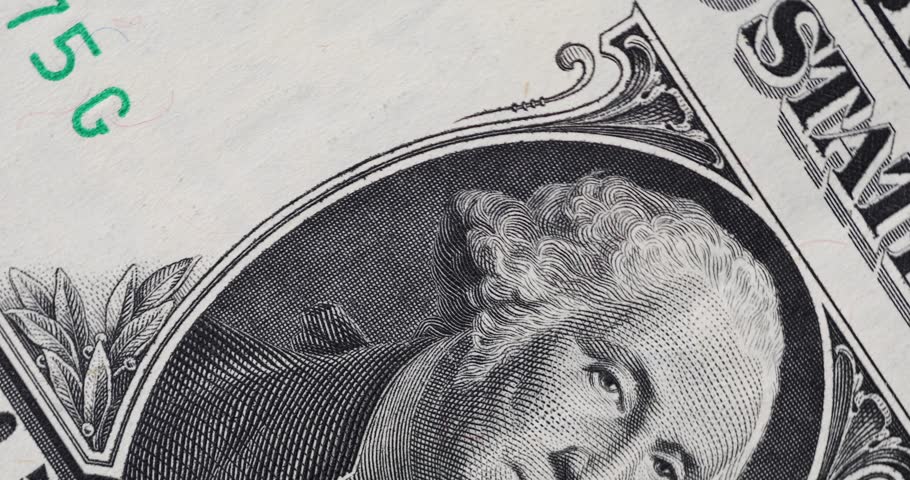 Close up macro George Washington portrait on one dollar bill footage