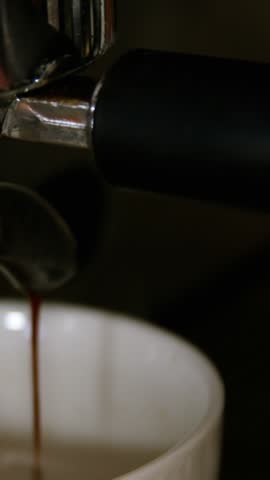Waiter making cup of coffee in cafÃ© 4k