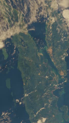 Strait of Malacca strategic maritime chokepoint visualized in a high resolution 4K aerial animation. This cinematic sequence showcases the critical waterway between the Malay Peninsula and Sumatra. Ideal for geopolitical news reports, global trade documentaries, and educational content focusing on Southeast Asian logistics and maritime security.