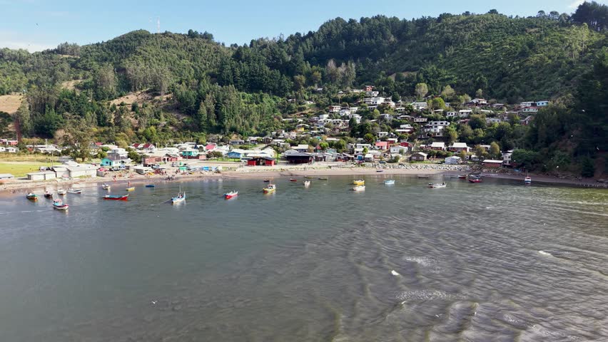 Artisanal fishing boats at the mouth of Rio Lingue in Mehuin, Chile.