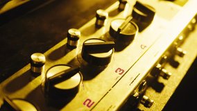 Music studio close up, Close up hands shot of sound engineer using mixing console, remote control for adjusting sound, audio mixer. Musician creates music, makes remix for DJ set. Sound recording - Powered by Shutterstock - Get 15% off with code: PIKWIZARD15