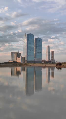 Reflection of high rise buildings at sea view Karachi Pakistan 