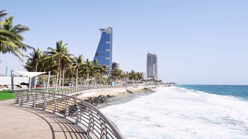 Jeddah, Saudi Arabia - May 14, 2022: Urban skyline along the Corniche by the sea, showing waterfront development, modern buildings, and coastal cityscape in a Middle Eastern setting.