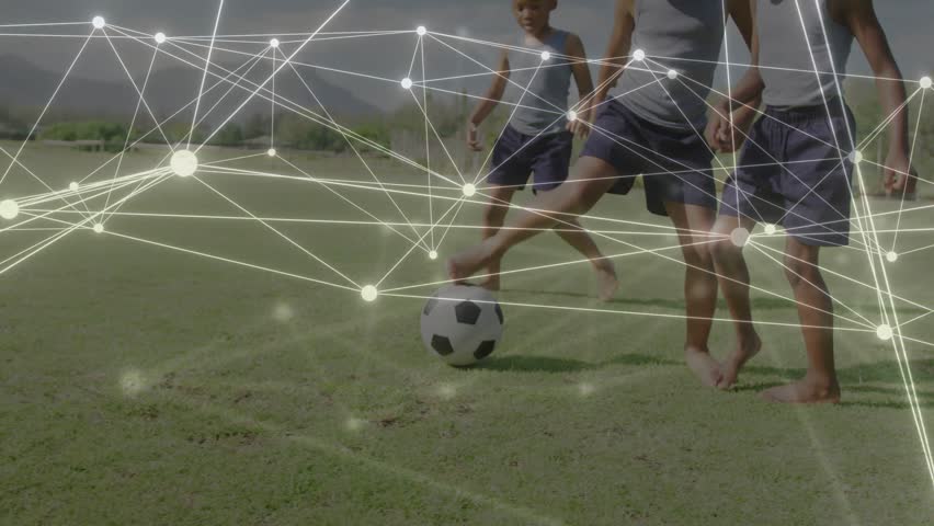 3 kids dribbling soccer ball foot tap sending ball as overlay drifting over players for sports. Outdoor, field, grass, children, barefoot, sleeveless, sunny