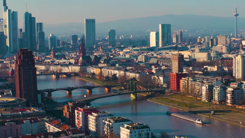 Aerial view around the downtown of the city Frankfurt am Main in Germany , on a sunny autumn afternoon. Beside the main  river