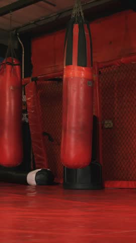 Man practicing karate in fitness studio