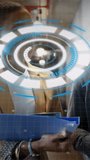 Vertical video: Team at glass display for tech demo, HUD pulsing, hands tapping holographic ring. Technology, collaboration, hologram, interface, immersive, futuristic, vertical video - Powered by Shutterstock - Get 15% off with code: PIKWIZARD15