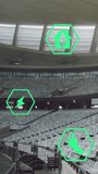 Vertical video: AR icons appearing over empty stands, pulsing and shifting to show green impact. Stadium, overlay, glyphs, sustainability, renewable, wind, vertical video - Powered by Shutterstock - Get 15% off with code: PIKWIZARD15