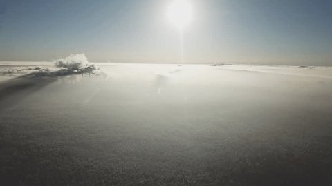 Drone Gliding Forward High Altitude above Landscape