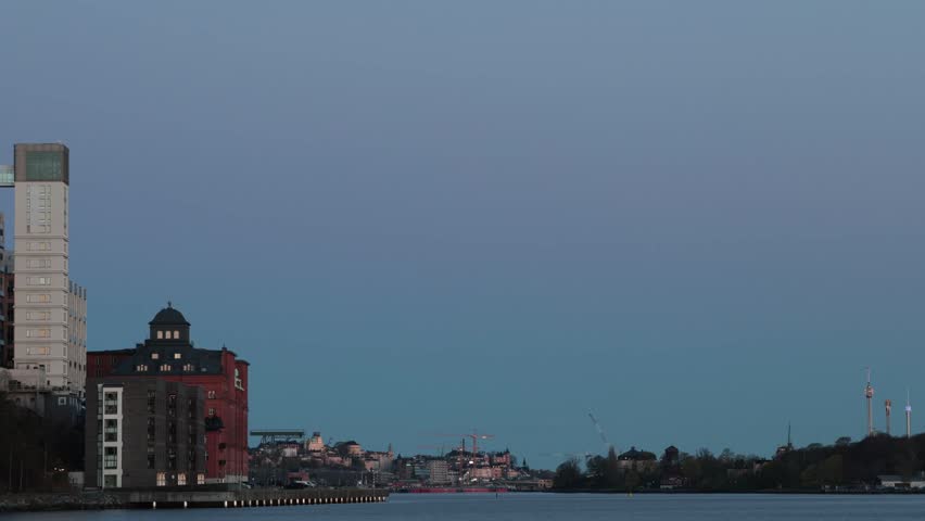 Stockholm, Sweden A sunrise view of the Kvarnholmen district and city skyline. 
