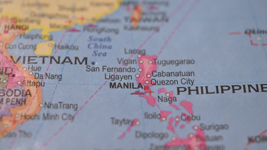 Hand Pointing Manila Philippines with Green Pin on World Map 4K 60fps