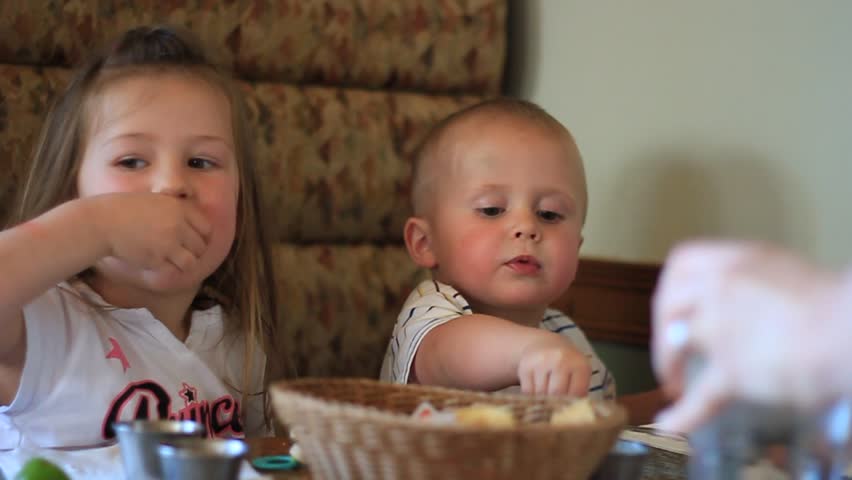 little kids eating drinking restaurant Stock Footage Video (100% ...