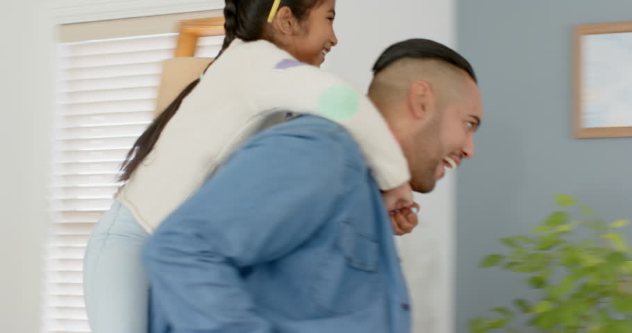 Diverse family hugging father arriving carrying daughter at kitchen island, unpacking groceries. Family, connection, warmth, home, togetherness, lifestyle, modern