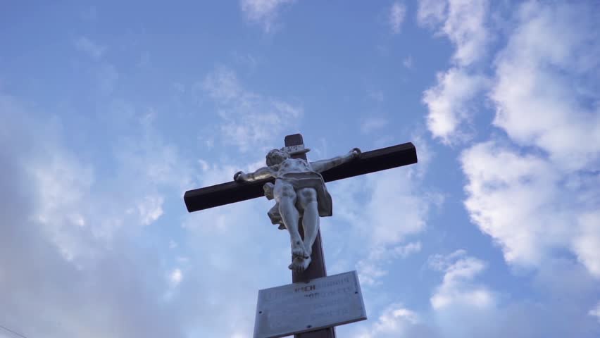 Dramatic Shot. Crucifixion Of Jesus Christ In The Rays Of The Setting Sun