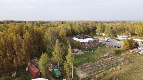 Drone Pulling Back over Oreshkovo Airfield Runway in Autumn