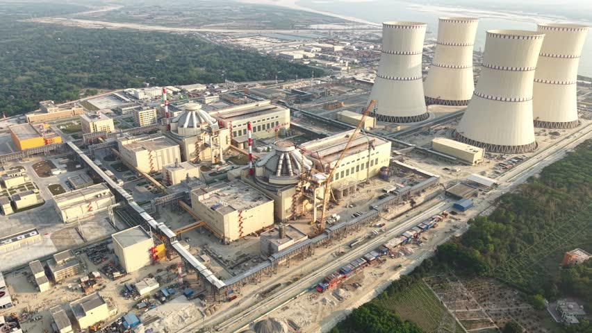 Nuclear power plant with cooling towers under construction