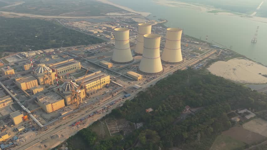 Aerial view of large power plant with cooling towers