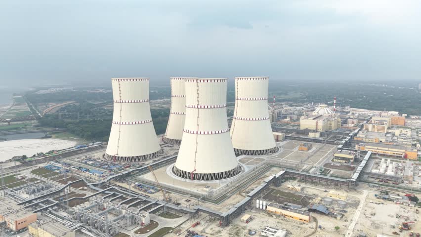 Nuclear power plant cooling towers aerial view