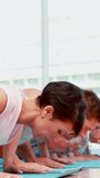 Exercise class doing push ups together at the gym - Powered by Shutterstock - Get 15% off with code: PIKWIZARD15