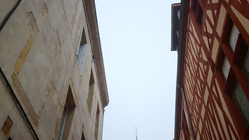 Notre Dame cathedral and half-timbered houses in Dijon, France