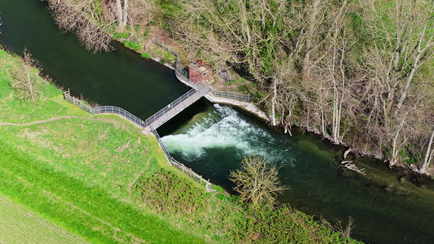 Aerial shot of a weir on the River Wylye near Salisbury, UK