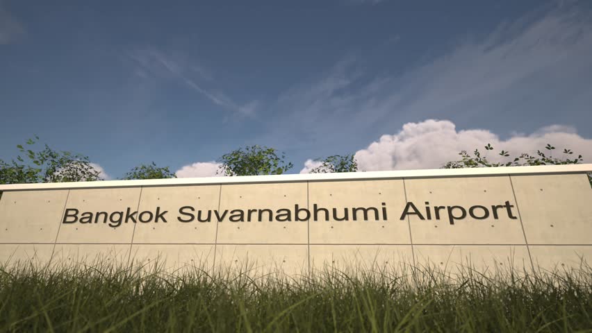 Arrivals at Bangkok Suvarnabhumi Airport with airplane landing near terminal, Bangkok, Thailand