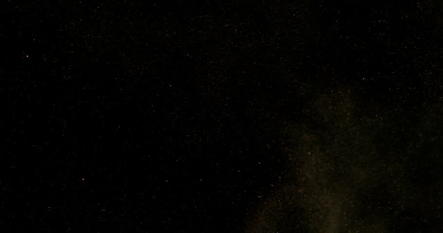 Super slow motion sandstorm and dust blizzard effect with airborne sand and fine particles, filmed at 500 fps on a high-speed camera. Isolated on black background, ideal as realistic VFX overlay.