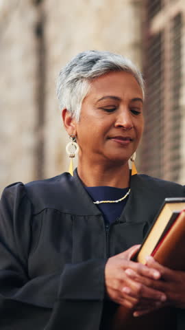Happy woman, judge and books with face in city with confidence, pride and legal career in street. Mature person, magistrate and smile for portrait in town with law, literature and justice in Mexico