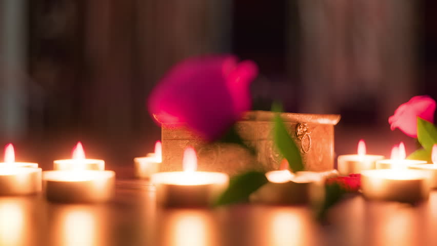 Candles in a heart formation, roses and a box. Great for valentines, christmas and other romantic purposes.