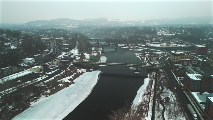 Aerial view of winter riverfront and bridges in Easton Pennsylvania