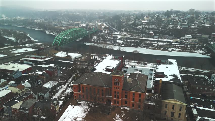Aerial view of Easton Pennsylvania with winter rooftops and bridges